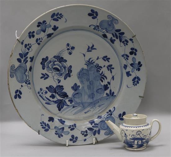 An English delftware blue and white dish, 14in. and a pearlware teapot